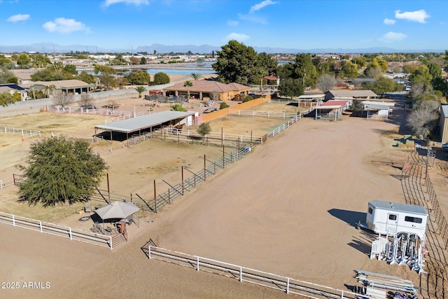 drone / aerial view with a water and mountain view