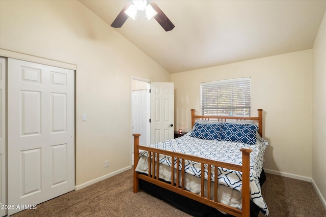 carpeted bedroom with a closet, vaulted ceiling, and ceiling fan