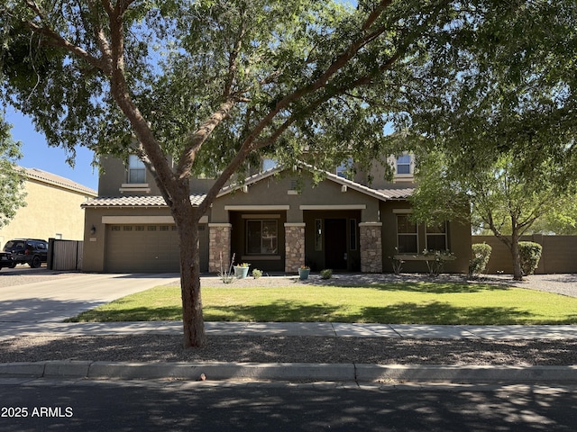 2735 E Flower Ct, Gilbert, AZ 85298 - view of front facade with stone siding, stucco siding, concrete driveway, and an attached garage