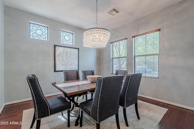 2735 E Flower Ct, Gilbert, AZ 85298 - dining space featuring wood finished floors, a chandelier, and baseboards