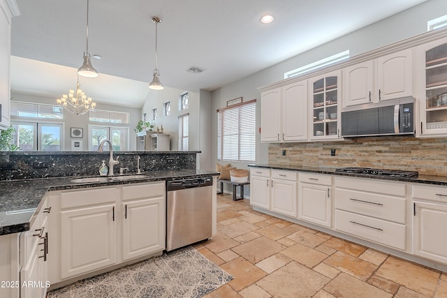 2735 E Flower Ct, Gilbert, AZ 85298 - kitchen featuring appliances with stainless steel finishes, a sink, tasteful backsplash, stone tile flooring, and recessed lighting