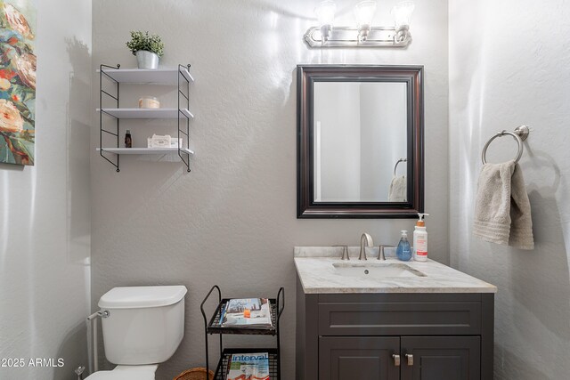 2735 E Flower Ct, Gilbert, AZ 85298 - bathroom with vanity and toilet