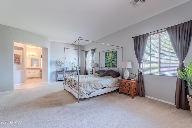 2735 E Flower Ct, Gilbert, AZ 85298 - carpeted bedroom featuring multiple windows, baseboards, and ensuite bath