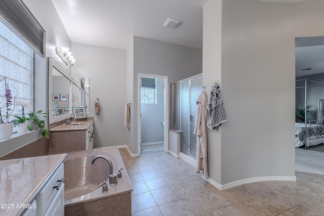 2735 E Flower Ct, Gilbert, AZ 85298 - ensuite bathroom featuring a shower stall, vanity, a bath, and tile patterned flooring
