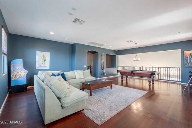 2735 E Flower Ct, Gilbert, AZ 85298 - living room with arched walkways, wood finished floors, baseboards, and recessed lighting