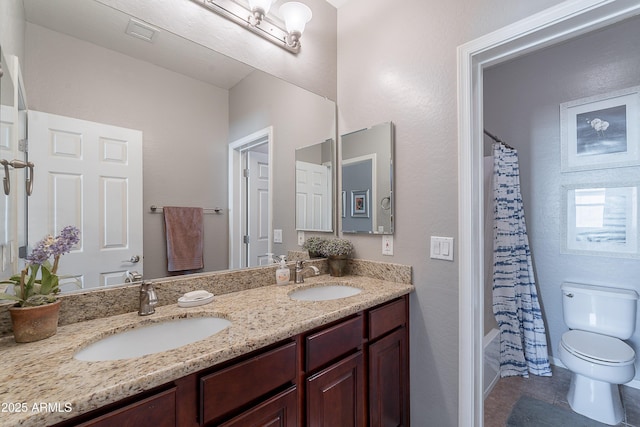 2735 E Flower Ct, Gilbert, AZ 85298 - bathroom with toilet, double vanity, and tile patterned flooring