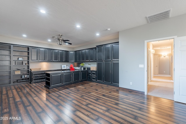 2735 E Flower Ct, Gilbert, AZ 85298 - kitchen with open shelves, dark wood finished floors, recessed lighting, ceiling fan, and dark cabinets