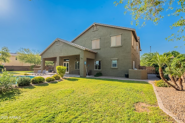 2735 E Flower Ct, Gilbert, AZ 85298 - rear view of house featuring stucco siding and a patio