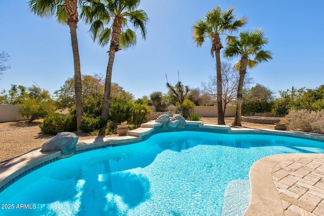 pool featuring fence