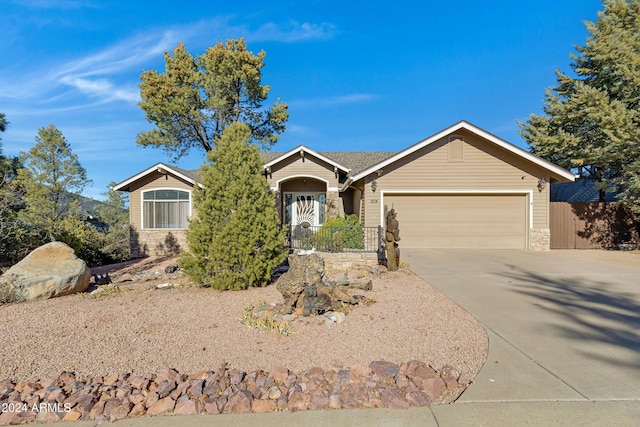 single story home with a garage