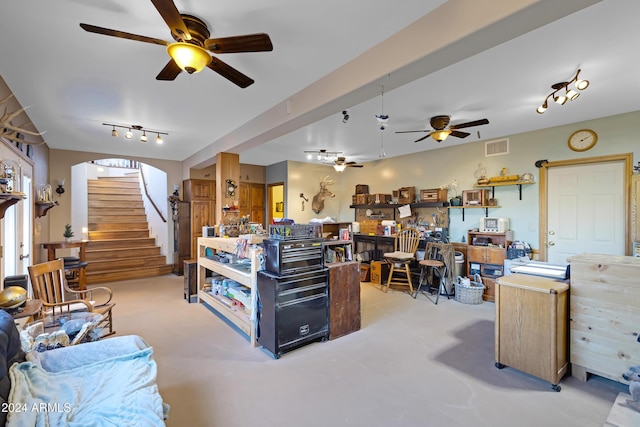 living room with ceiling fan