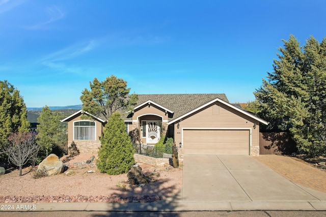 single story home featuring a garage