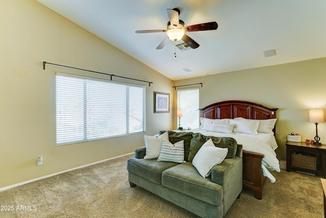 carpeted bedroom featuring a ceiling fan, lofted ceiling, visible vents, and baseboards