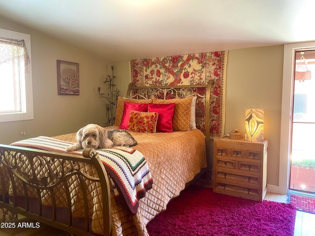 1608 W W Blvd, Bisbee, AZ 85603 - bedroom featuring multiple windows and wood finished floors