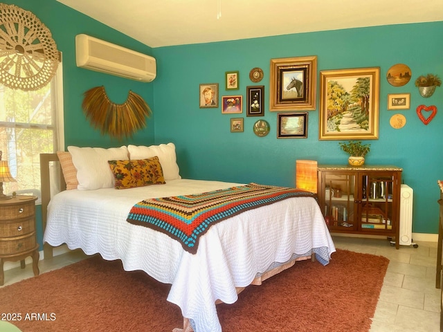 1608 W W Blvd, Bisbee, AZ 85603 - tiled bedroom featuring a wall unit AC and baseboards