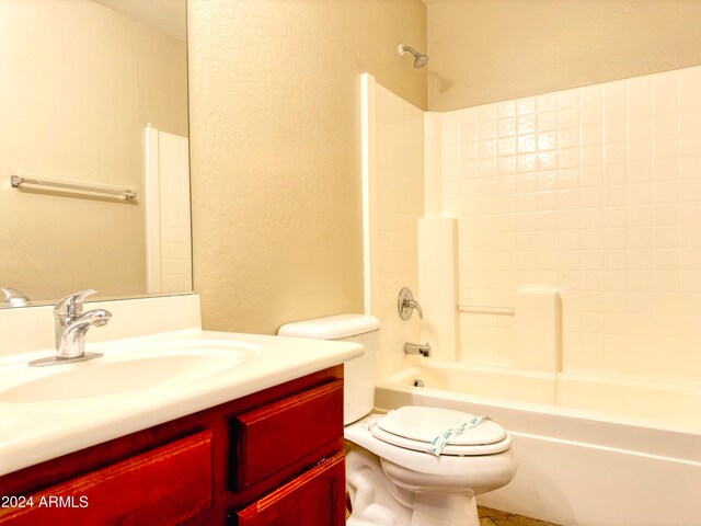 full bathroom featuring toilet, vanity, and shower / bath combination