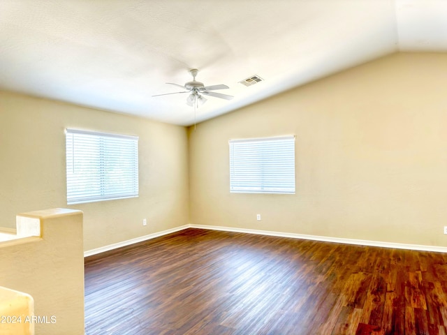 unfurnished room with ceiling fan, hardwood / wood-style flooring, and lofted ceiling