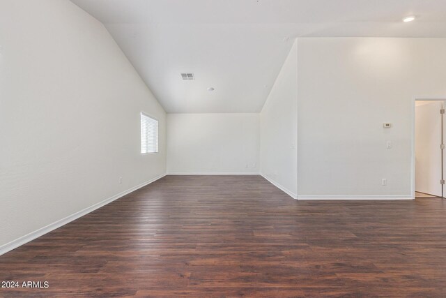 unfurnished bedroom with ceiling fan and dark hardwood / wood-style flooring