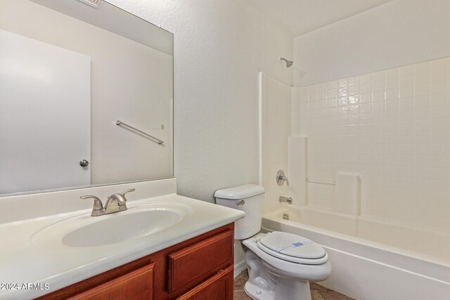 bathroom featuring toilet, vanity, and wood-type flooring