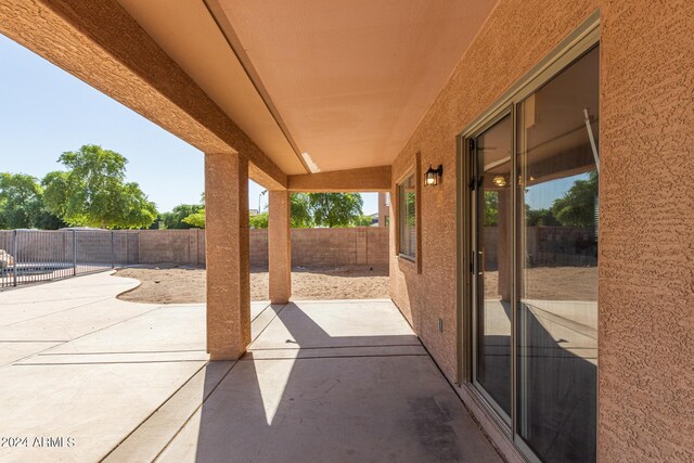 view of yard with a pool and a patio