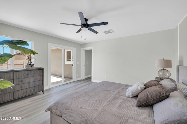 5236 S 19th Ave, Phoenix, AZ 85041 - bedroom featuring light wood-type flooring, ceiling fan, and baseboards