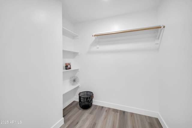 5236 S 19th Ave, Phoenix, AZ 85041 - spacious closet with wood finished floors