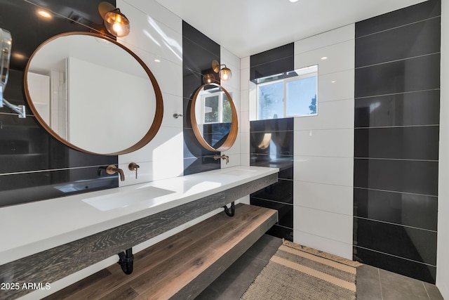 bathroom featuring vanity, tile walls, and tile patterned floors