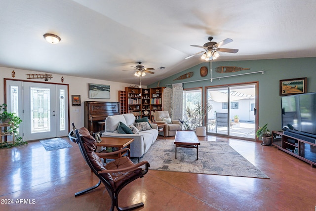 living room with ceiling fan and lofted ceiling