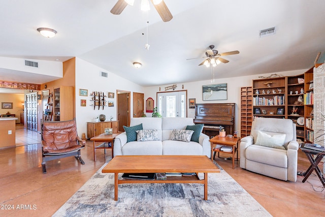 tiled living room featuring ceiling fan, lofted ceiling, and french doors