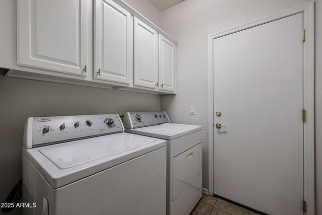 45633 W Mountain View Rd, Maricopa, AZ 85139 - clothes washing area featuring separate washer and dryer, cabinet space, and tile patterned flooring