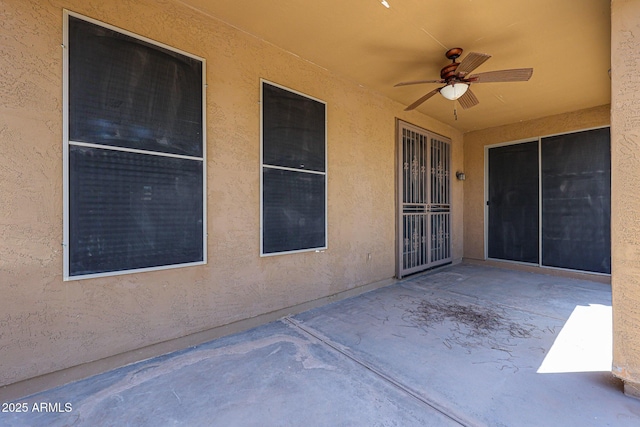 45633 W Mountain View Rd, Maricopa, AZ 85139 - view of patio / terrace featuring a ceiling fan