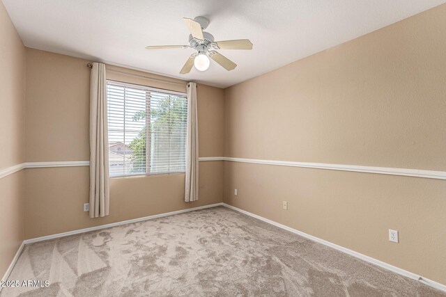4426 E Coyote Wash Dr, Cave Creek, AZ 85331 - carpeted spare room featuring ceiling fan and baseboards