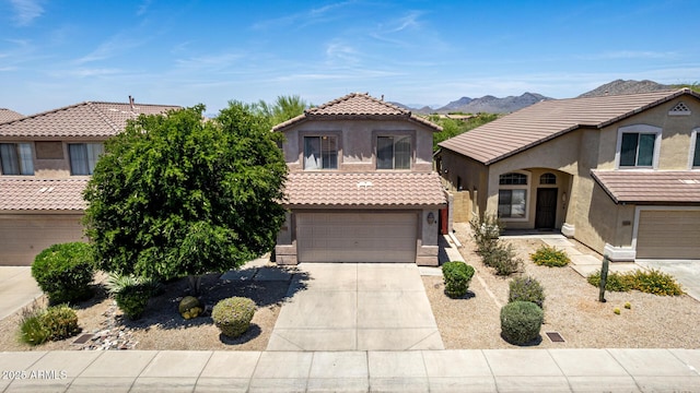 4426 E Coyote Wash Dr, Cave Creek, AZ 85331 - view of front of home with stucco siding, a tiled roof, a garage, and driveway