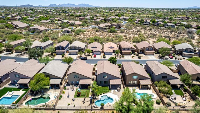 4426 E Coyote Wash Dr, Cave Creek, AZ 85331 - aerial perspective of suburban area with a pool and a mountainous background