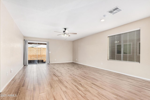 unfurnished room with ceiling fan and light hardwood / wood-style floors