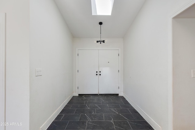 interior space with baseboards