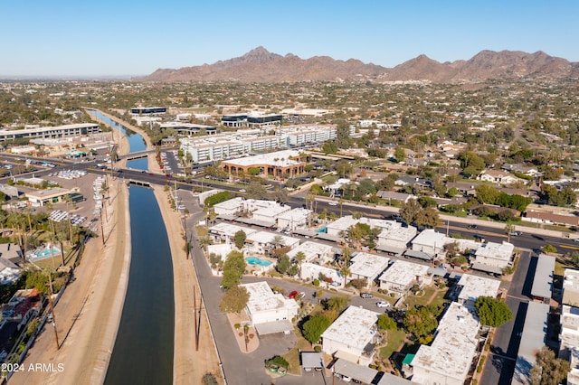 drone / aerial view featuring a mountain view