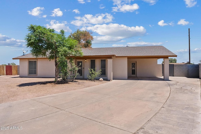 1160 E Hampton Cir, Mesa, AZ 85204 - view of front of property featuring concrete driveway, a carport, and stucco siding