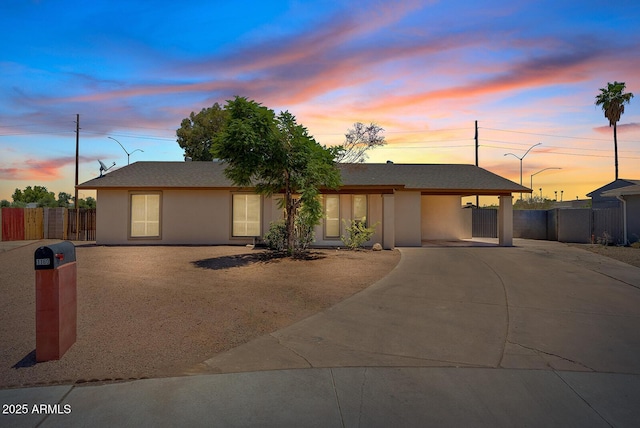 1160 E Hampton Cir, Mesa, AZ 85204 - ranch-style home featuring concrete driveway, stucco siding, and a carport