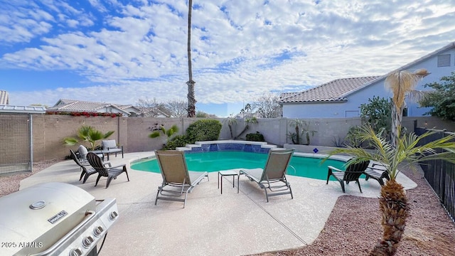 view of pool featuring a patio