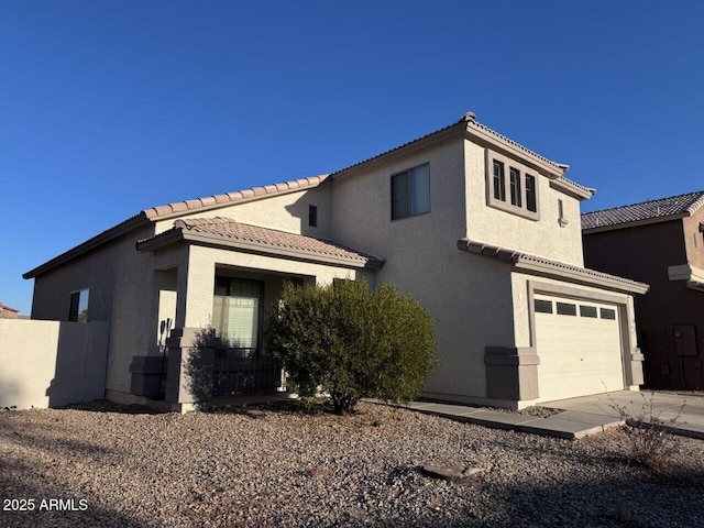 view of front of property featuring a garage