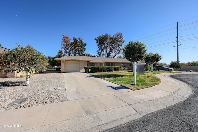 single story home with a garage and a front yard