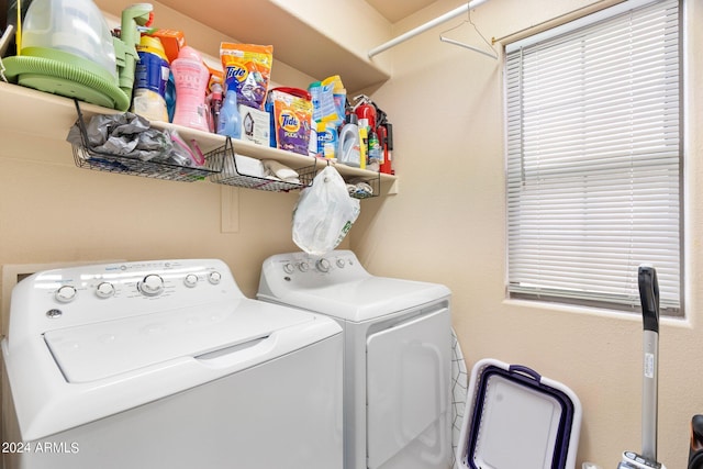 laundry room featuring laundry area and separate washer and dryer