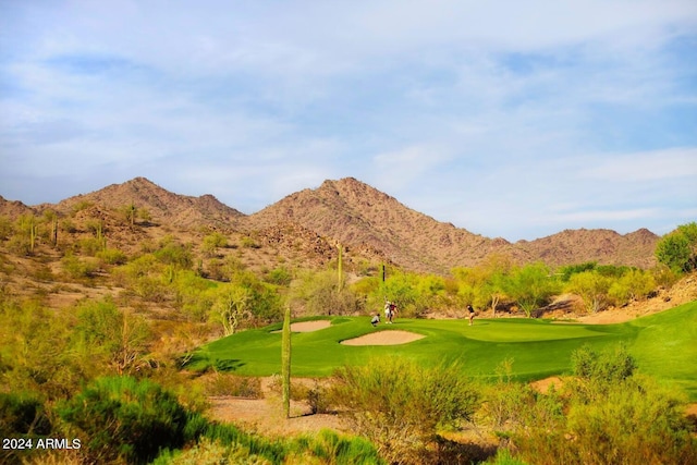 view of community featuring a mountain view and golf course view