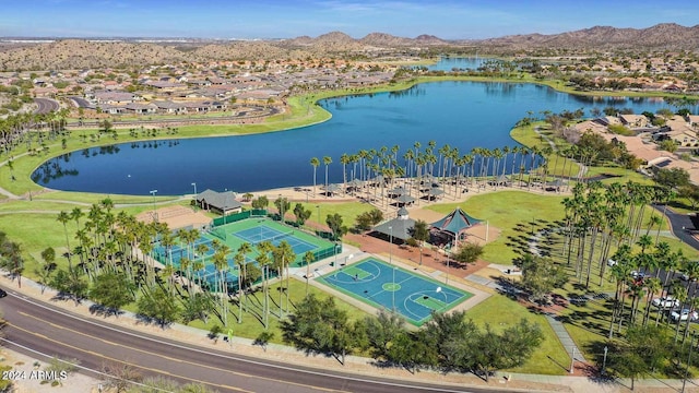 birds eye view of property featuring a water and mountain view