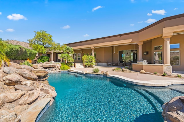 view of swimming pool with a patio area