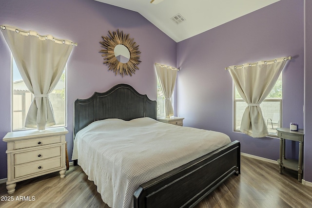 16523 W Desert Bloom St, Goodyear, AZ 85338 - bedroom with lofted ceiling and wood finished floors