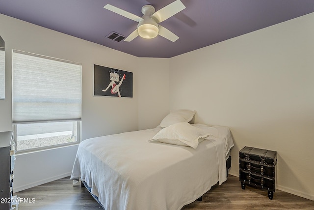 16523 W Desert Bloom St, Goodyear, AZ 85338 - bedroom with wood finished floors and a ceiling fan