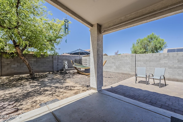 16523 W Desert Bloom St, Goodyear, AZ 85338 - fenced backyard featuring a patio area