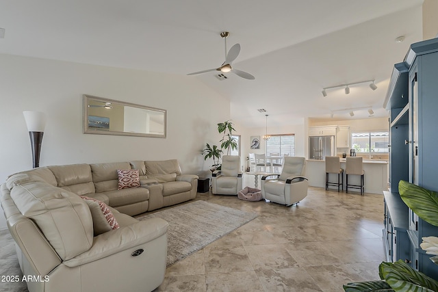 16523 W Desert Bloom St, Goodyear, AZ 85338 - living area with ceiling fan and vaulted ceiling